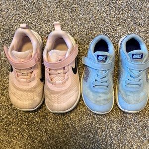 2 pair of used toddler Nike shoes.  Both are size 9 (toddler)